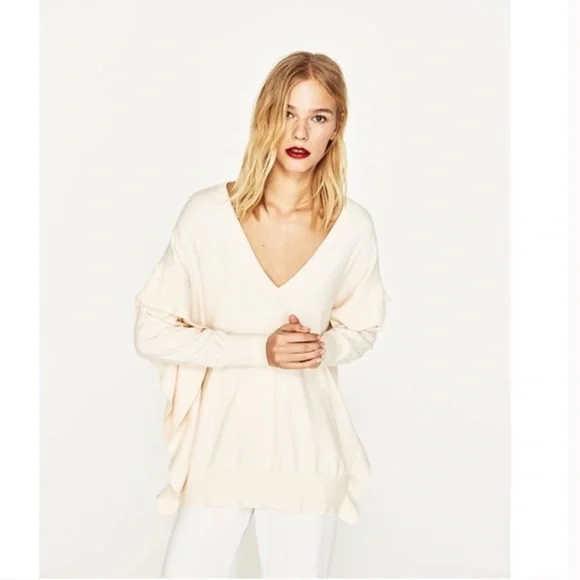 Side Ruffle V-neck Oversized sweater in ivory - Picture 1 of 4